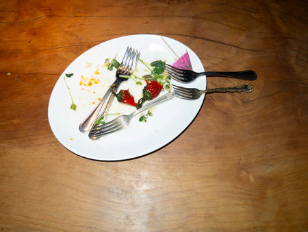 strawberry salad with fork on wood table, shallow depth of fieldの写真素材