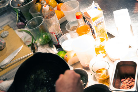 Mixing ingredients in the kitchen. Preparing a delicious and healthy breakfast.の写真素材