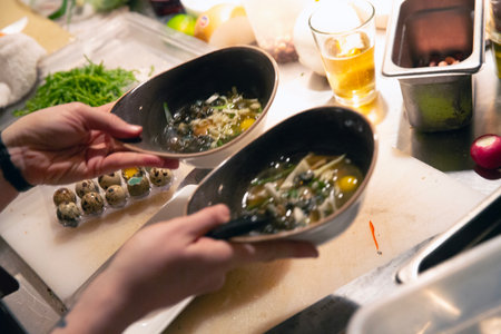 Closeup of a woman's hands cooking Japanese miso soup.の写真素材