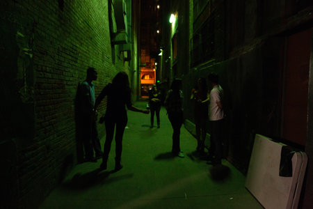 People in the street at night, in Shenzhen, China.の写真素材