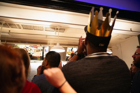 Unidentified people with crowns in Barcelona, Spain.の写真素材