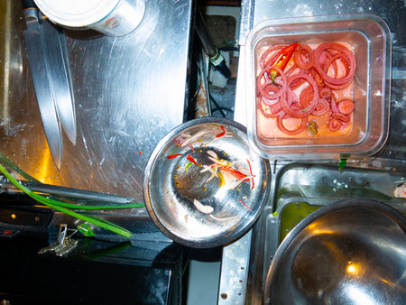 cooking vegetables in the kitchen of a restaurant, closeup of photoの写真素材