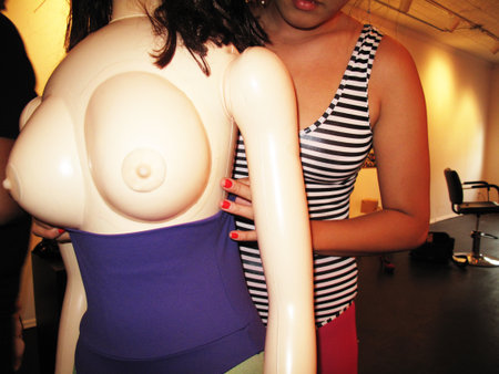 A model gets ready backstage at the 2013 Victoria's Secret Fashion Show at Lexington Avenue Armory in New York City.の写真素材