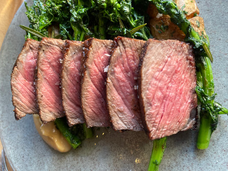 Beef filet mignon steak with kale and dillの写真素材