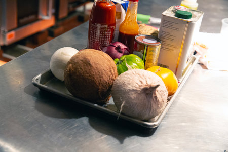Coconut fruits and vegetables in a container on the table.の写真素材