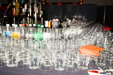 Catering, wedding, party, celebration and entertainment concept - close up of empty champagne glassesの写真素材