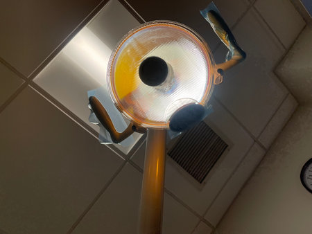 lamp on the ceiling of a hotel room, closeup of photoの写真素材