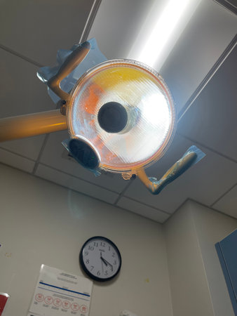 surgical lamps in operation room take with art lighting and blue filterの写真素材