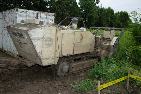 Abandoned excavator in the field, close-up.の写真素材