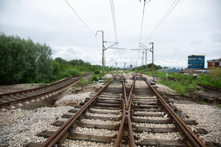 railway tracks in the countryside on a cloudy day. perspective viewの写真素材