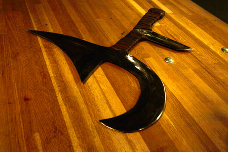 Medieval weapons on the wooden table, close-up of photoの写真素材