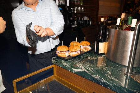 Bartender at the bar counterの写真素材