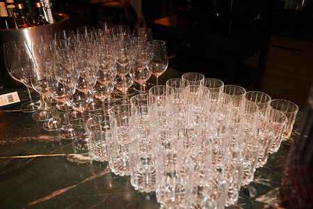 Wineglasses on the table in a restaurant. Luxury celebrationの写真素材