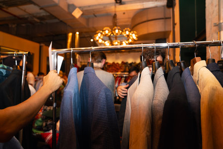 Young african american DJ playing music in the nightclub at nightの写真素材