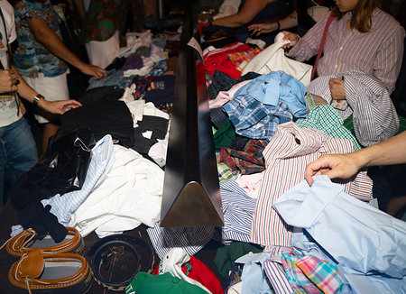 Hands of a fashion designer working on a new collection of clothesの写真素材