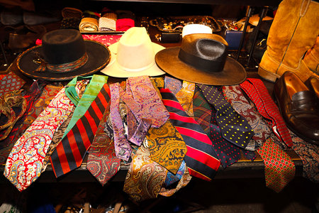 Hanging clothes in a row in a fashion store, back viewの写真素材