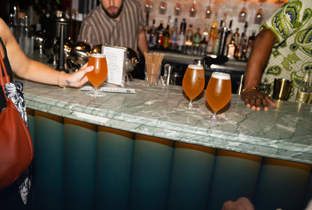 Clothes and accessories on the table in the store, close-upの写真素材