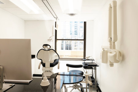 Interior of a modern dental clinic, dental chair and other equipmentの写真素材