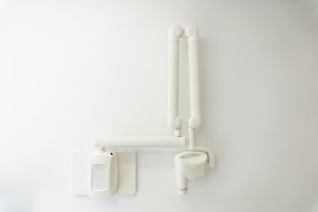White wall with mounted fixtures.の写真素材