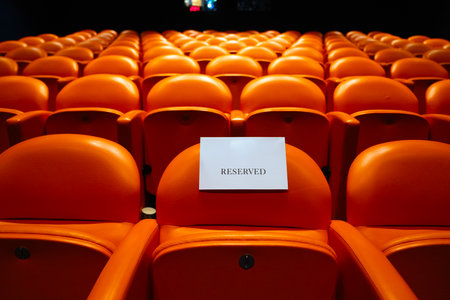 Empty seats in the auditorium of a theater.の写真素材