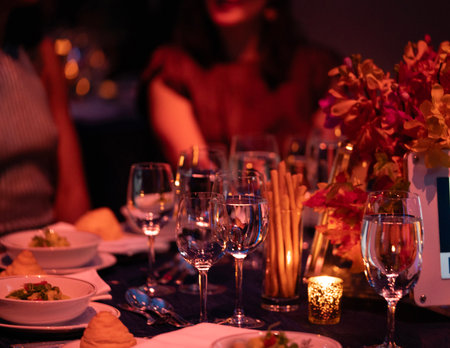 Catering service in a restaurant. Selective focus on wine glassesの写真素材