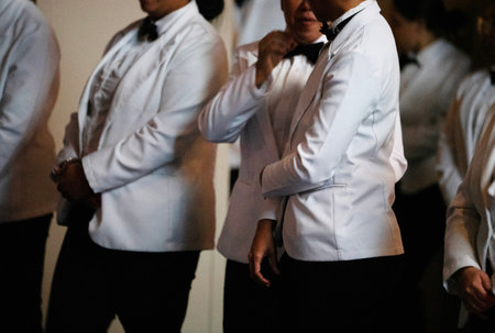 Waiter preparing for the wedding ceremony.