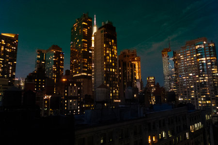 Cityscape of New York City at night with skyscrapers.の写真素材