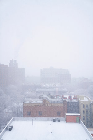 View of the city from the roof of a residential building in winterの写真素材