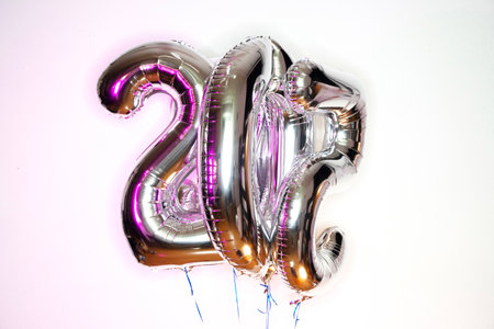 Number twenty-one silver balloon on a white background. Birthday greeting cardの写真素材