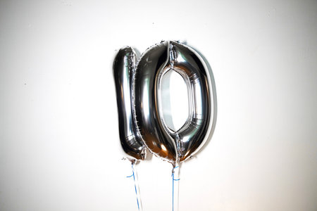 Silver balloon number 10. Birthday greeting card with the inscription 10.の写真素材