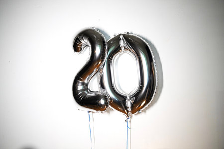 Number 20 silver foil balloon isolated on white background. Happy New Yearの写真素材
