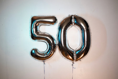 Number 50 silver balloon on a white background. Birthday or anniversary celebration.の写真素材