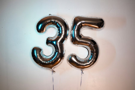 Number 35 balloon on a white background. Birthday or anniversary celebration.の写真素材
