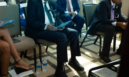 Business people sitting and discussing during a meeting in the conference room.の写真素材