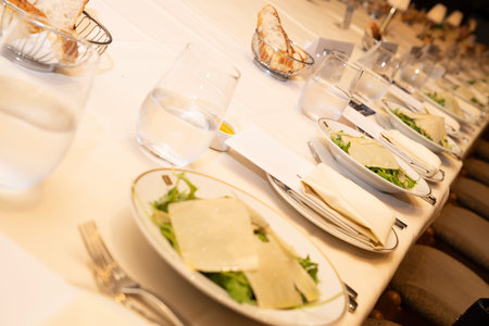 Table set for a wedding or another catered event dinner. Selective focus.