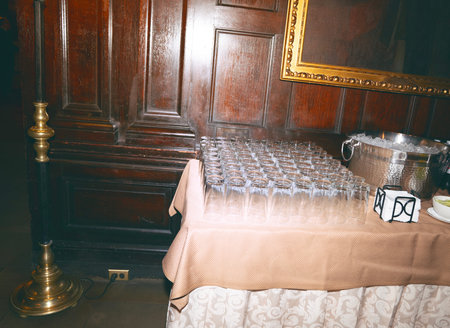 Wedding Banquet Table with Wine Glasses and Tablecloth