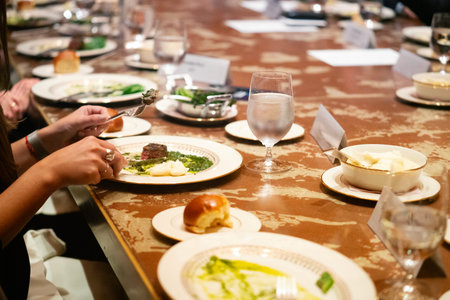 Catering service. Cropped image of two unrecognizable people having dinner at restaurant