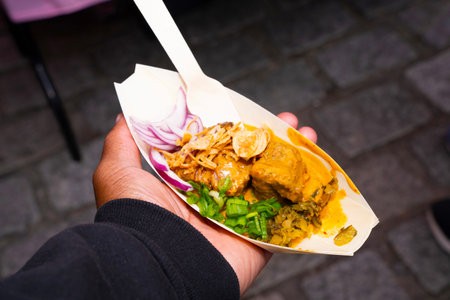 Traditional mexican food in a woman's hand, street food