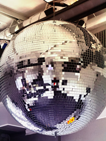 Disco ball in a modern dance hall, closeup of photo