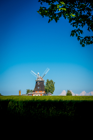 Windmill and blue sky background.の写真素材