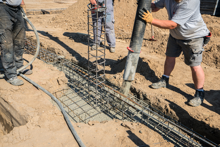 on a construction site, a foundation is laidの写真素材
