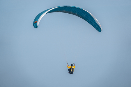 some paragliders fly along the steep coast of the Baltic Seaの写真素材