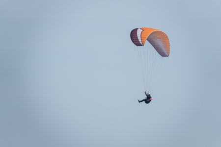 some paragliders fly along the steep coast of the Baltic Seaの写真素材