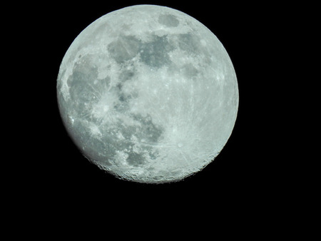 almost full moon in the night skyの写真素材