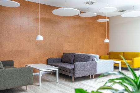 a cosy sitting area in a lounge provides a pleasant working atmosphereの写真素材