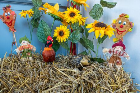 on a bale of straw apples and pumpkins were lovingly arranged as decoration