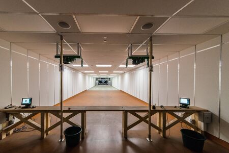 in a large indoor shooting range can train sport shooters