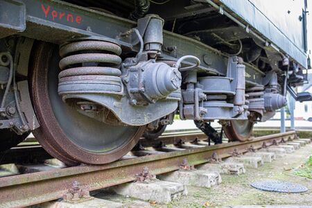 an old historical train of the Deutsche Reichsbahn from the times of the GDR stands on a sidingの写真素材