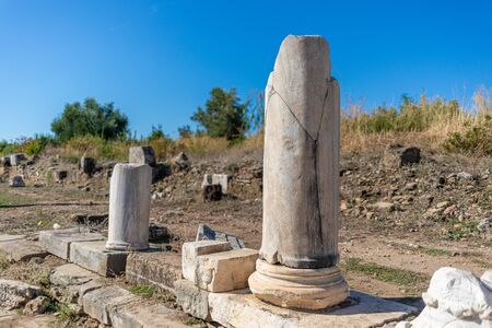 in the old ruins of Side there are many columns and ornaments made of stoneの写真素材