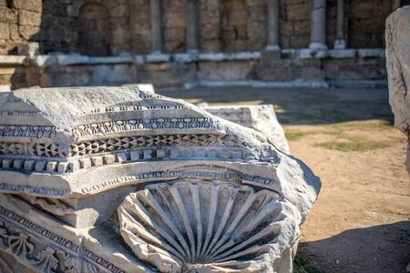 in the old ruins of Side there are many columns and ornaments made of stoneの写真素材
